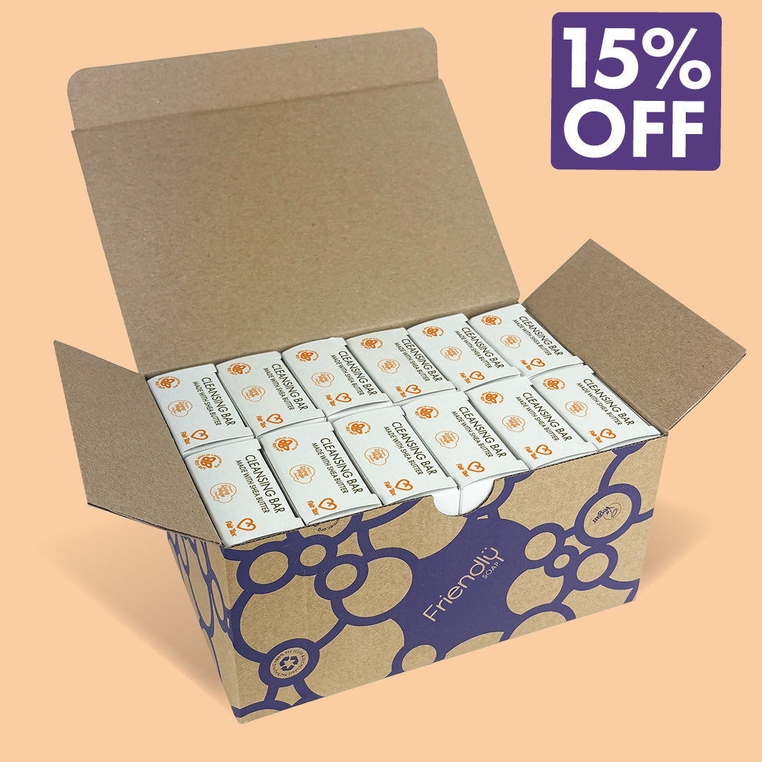 An open brown cardboard box containing 12 bergamot cleansing bars