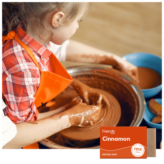 mother and child using a potters wheel. Friendly cinnamon natural soap bar