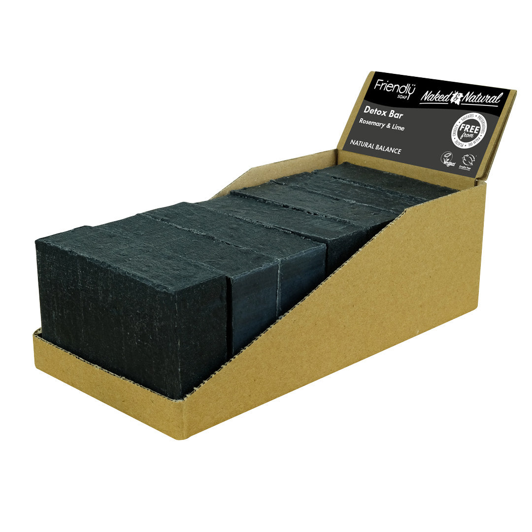 Seven Detox bars in a cardboard display with a branded label on a white background