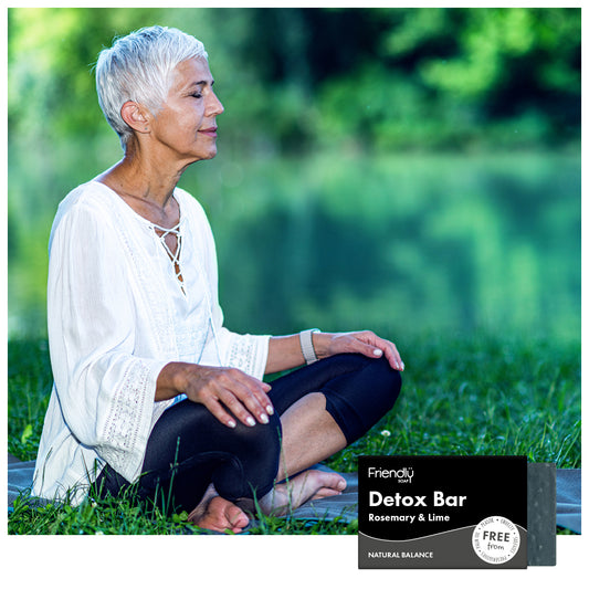 mature woman practicing meditation in the lotus position