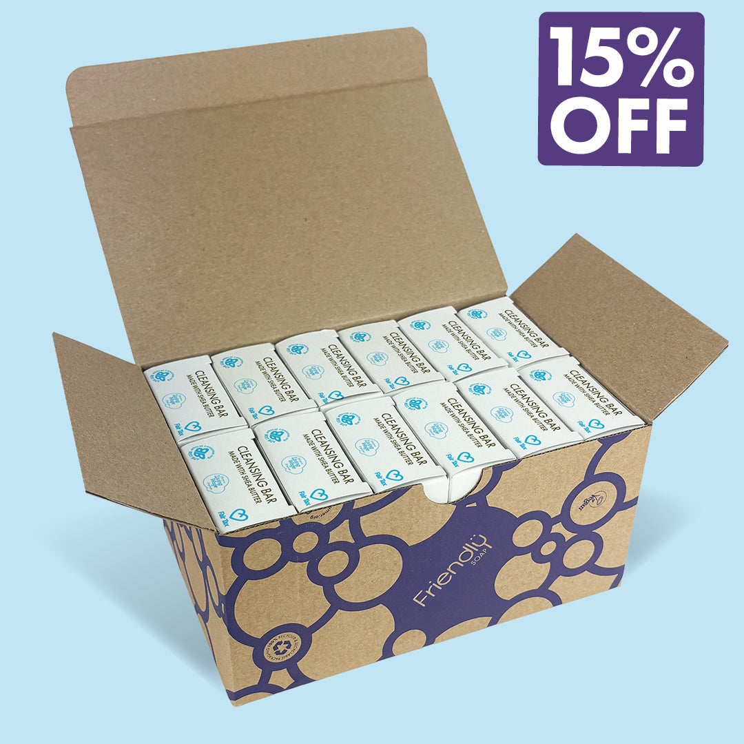 An open brown cardboard box filled with 12 Eucalyptus '15% OFF' badge in the top right. The box has a blue bubble pattern and the brand name 'Friendly Soap' is visible on the front.