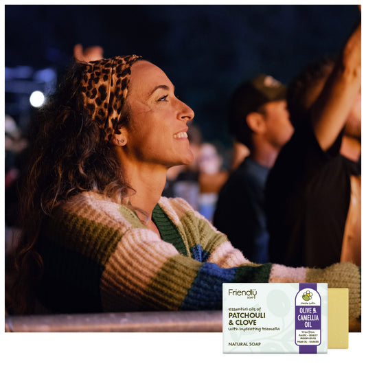 woman at a music festival with a friendly soap patchouli and clove bar