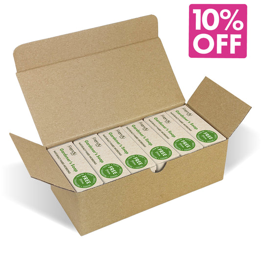 An open kraft cardboard box containing six friendly gardener's soap bars, with a pink '10% OFF' promotional sticker overlay in the top right corner.