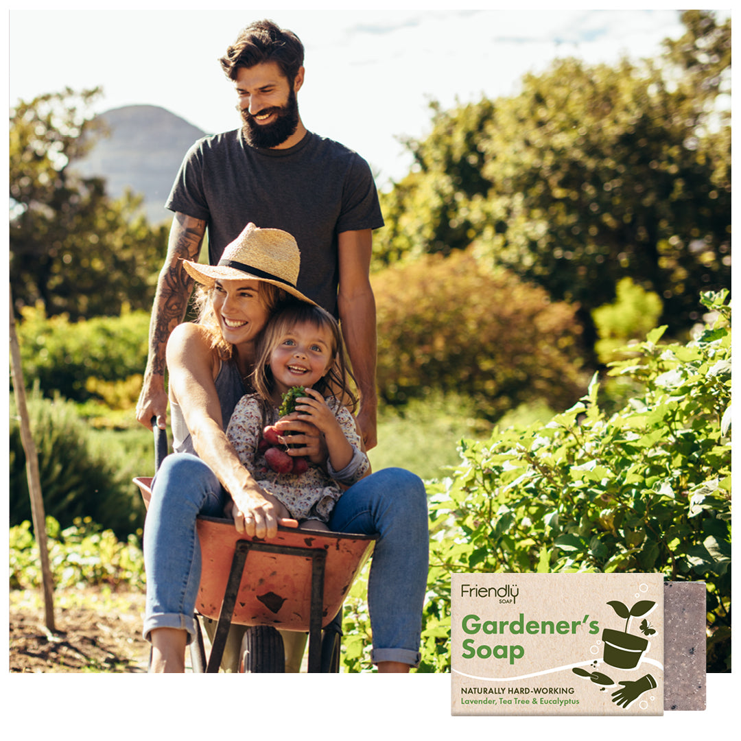 family having fun in a garden with a friendly soap - gardeners soap bar