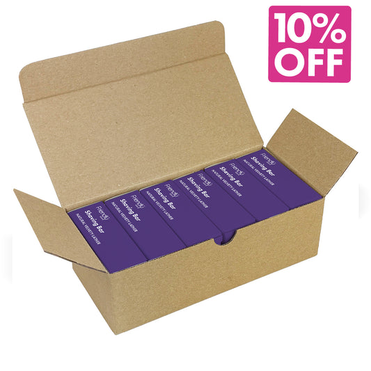 An open brown cardboard box containing several purple rectangular shampoo bar boxes labeled 'Shampoo Bar'. A pink promotional badge in the top right corner reads '10% OFF'. 