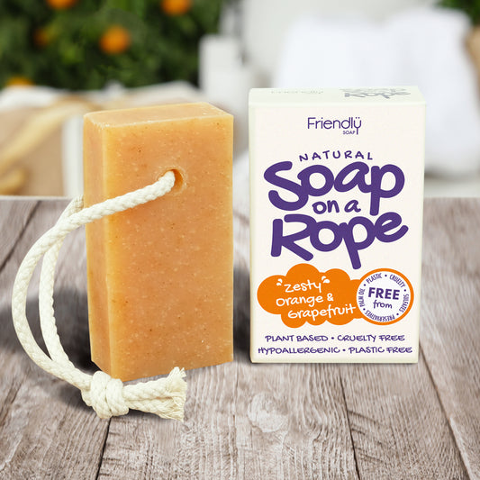 friendly soap on a rope orange -  on a table in the bathroom