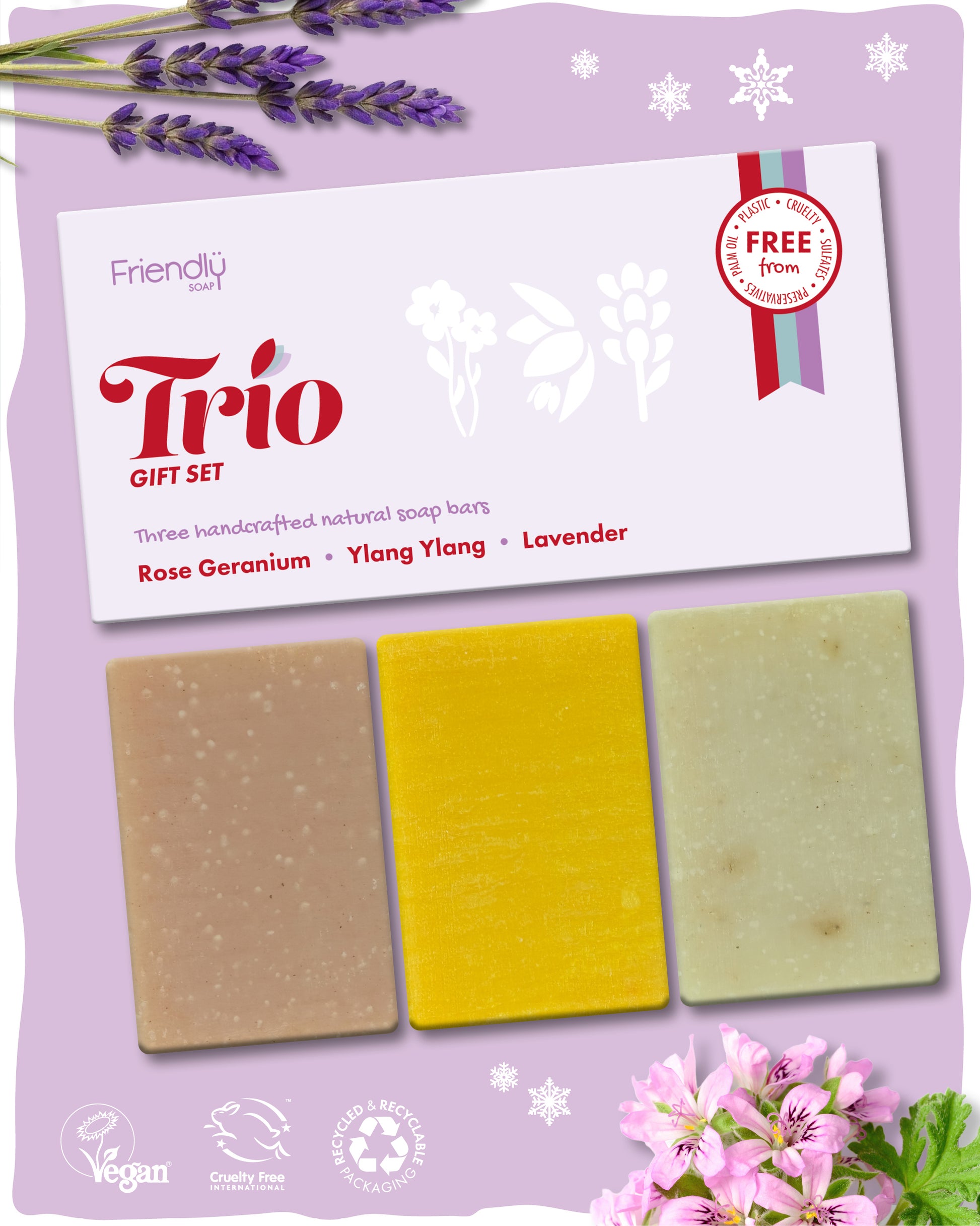 Friendly soap trio gift set surrounded by lavender and rose geranium flowers