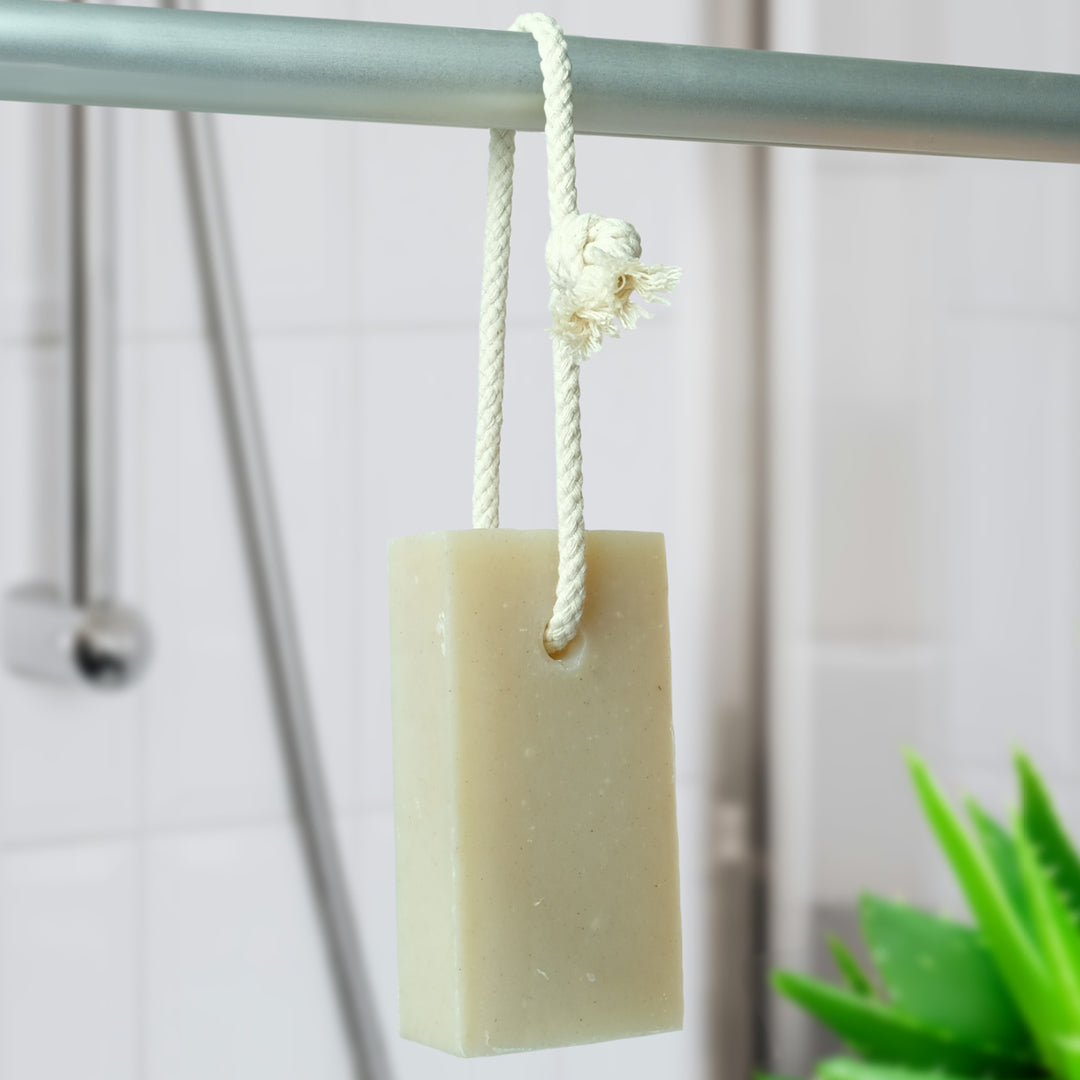 aloe vera - friendly soap on a rope hanging up in shower room