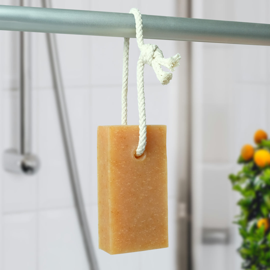 orange & grapefruit - friendly soap on a rope hanging up in shower room